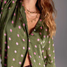 Model wears East Heritage Jenny Green satin shirt