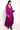 Model wears East Heritage Viviane Purple Satin Dress