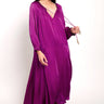 Model wears East Heritage Viviane Purple Satin Dress