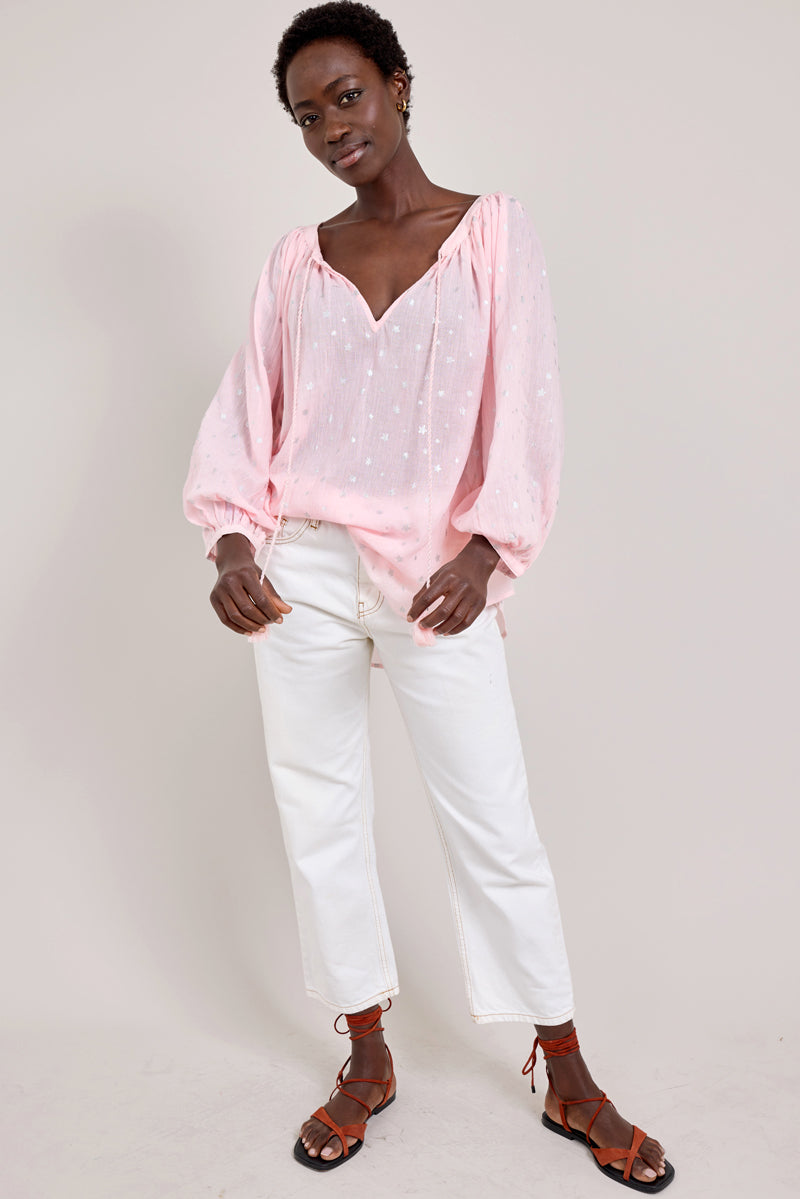Model wears East Celeste Pink Silver Foil Star Top