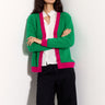 Model wears EAST Kally Green and Pink Cashmere Button Cardigan