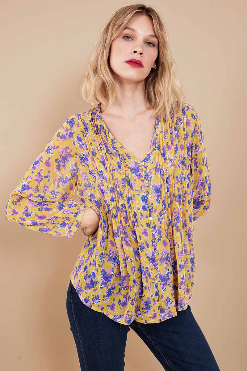 yellow blouse with flowers